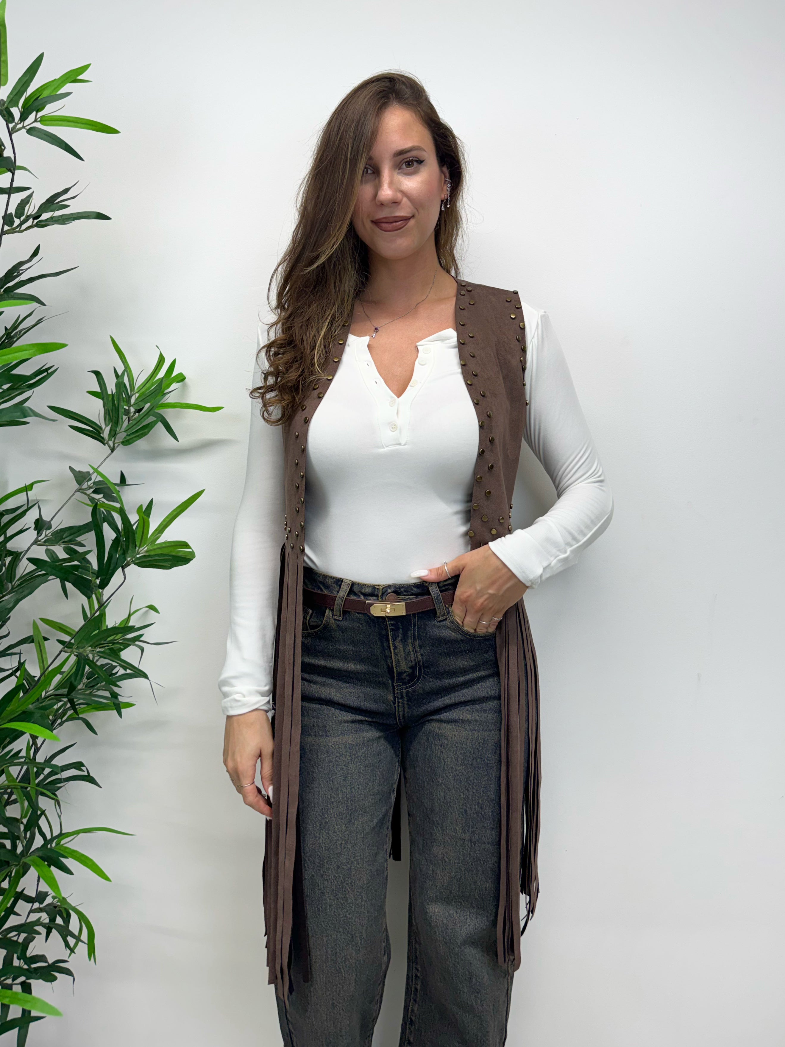Gilet con frange e borchiette