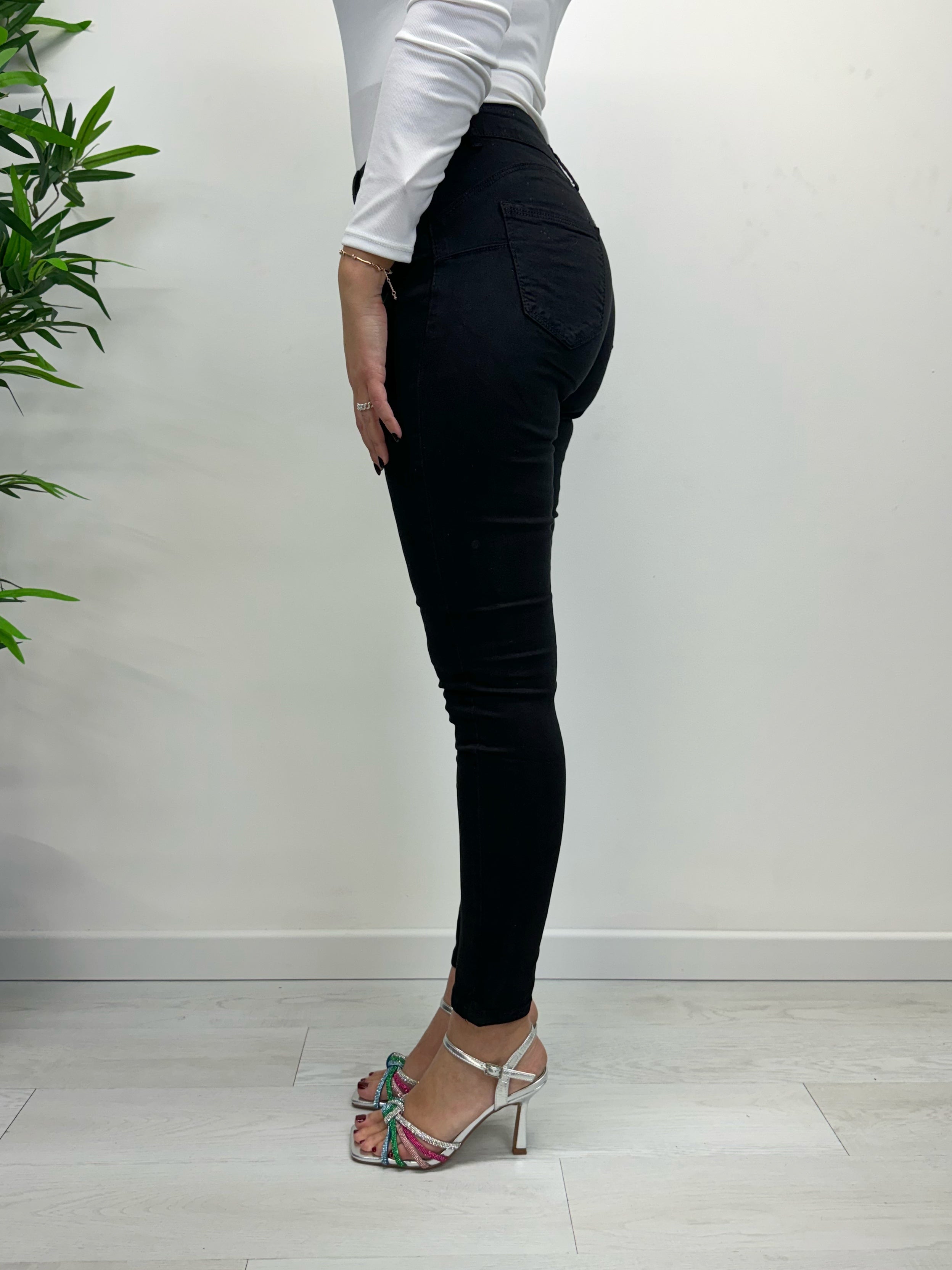 Skinny jeans vita medio alta