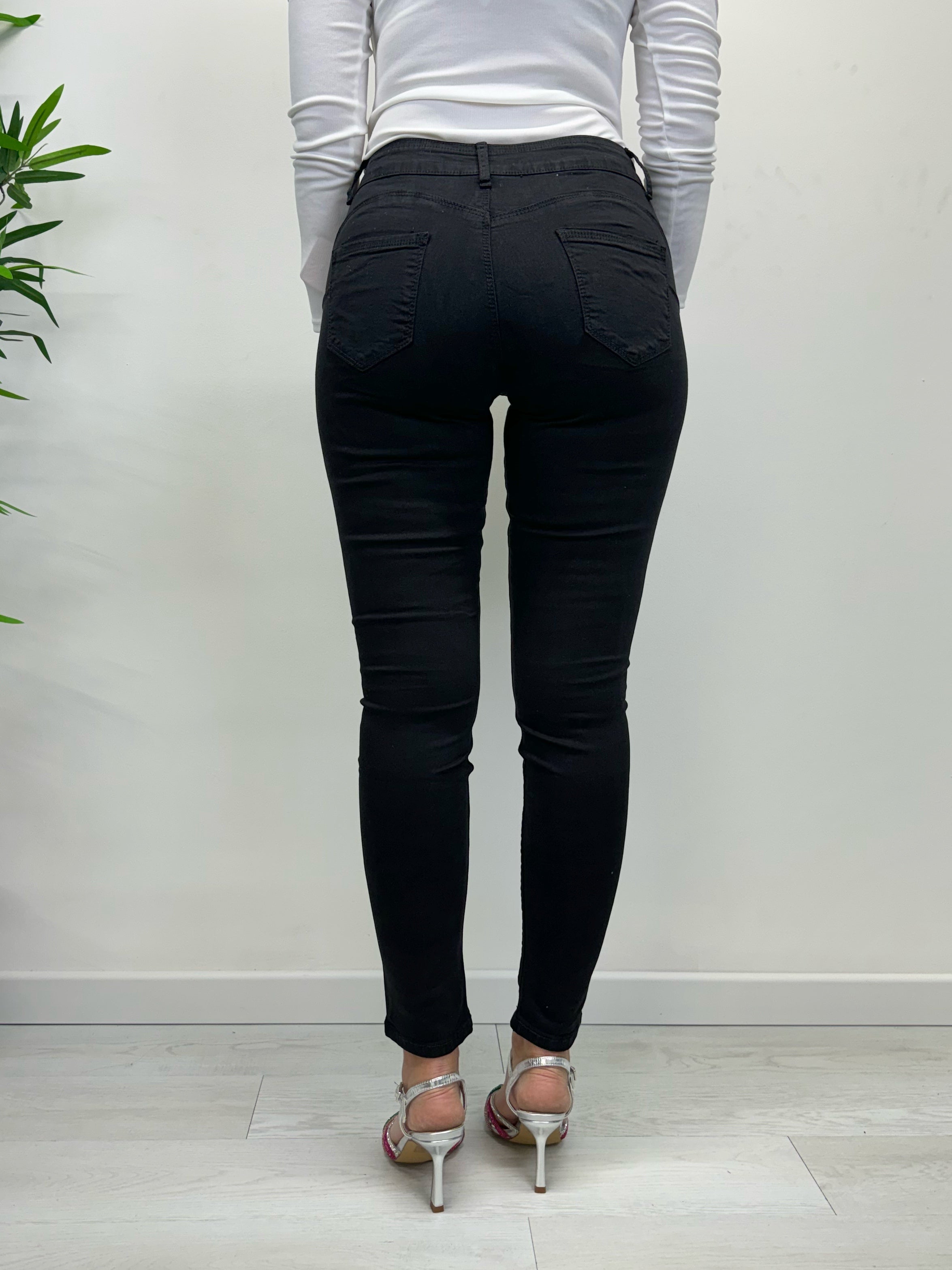 Skinny jeans vita medio alta